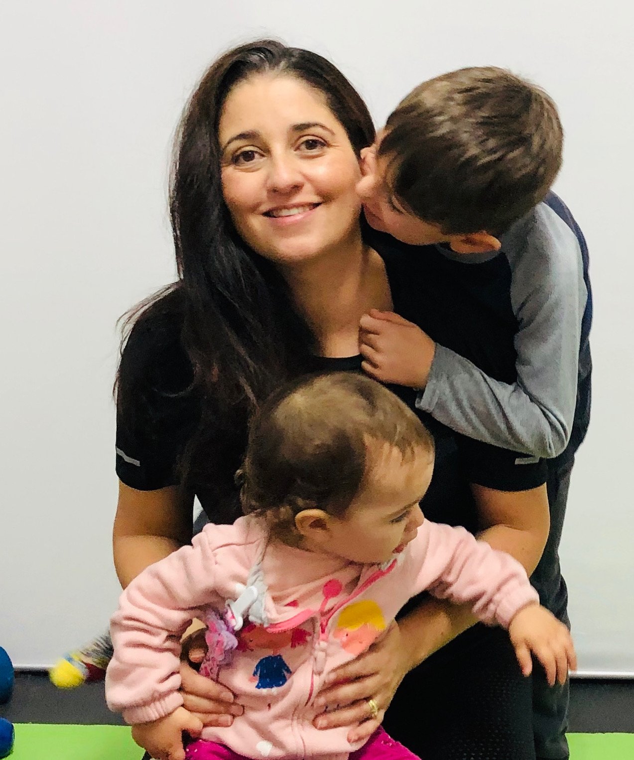 Coach Tam Lopes with her 2 children
